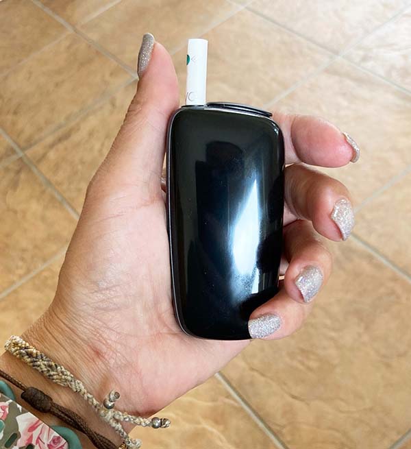 The Ploom X Heated Tobacco Kit with an EVO stick inserted