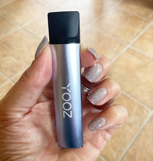 YOOZ Pod Vape Kit held in a hand